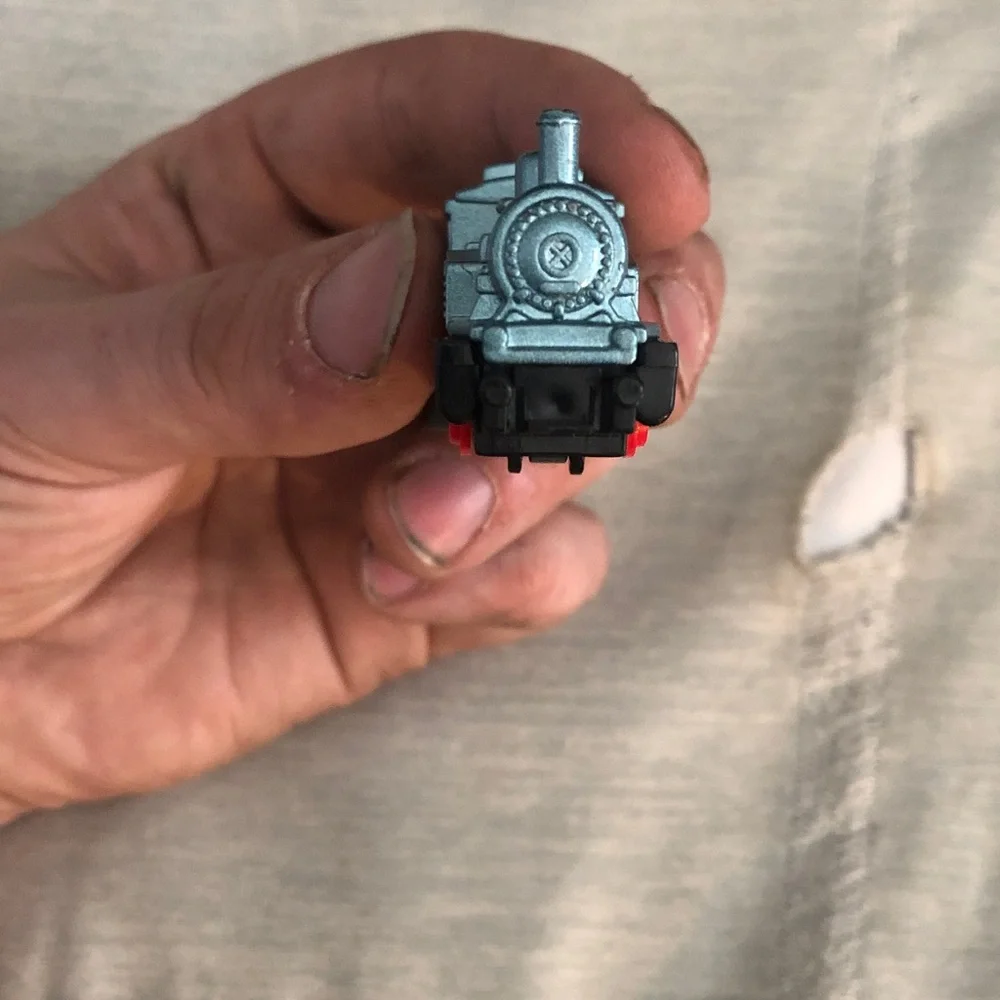 Blue and Red Toy Train with Gold Accents
